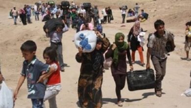 صورة تقديم مساعدات ايوائية للنازحين والمهمشين بلودر