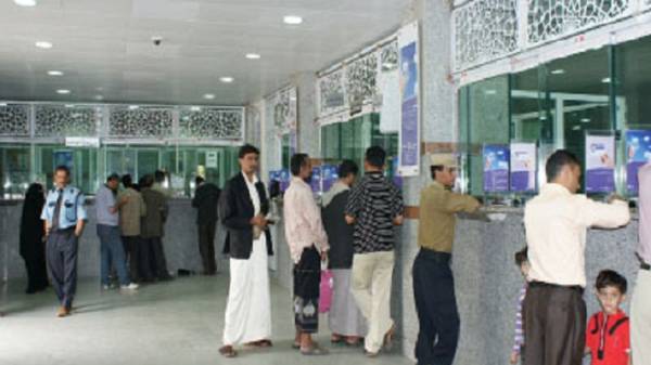 صورة نهب محل للصرافة فى مدينة إب